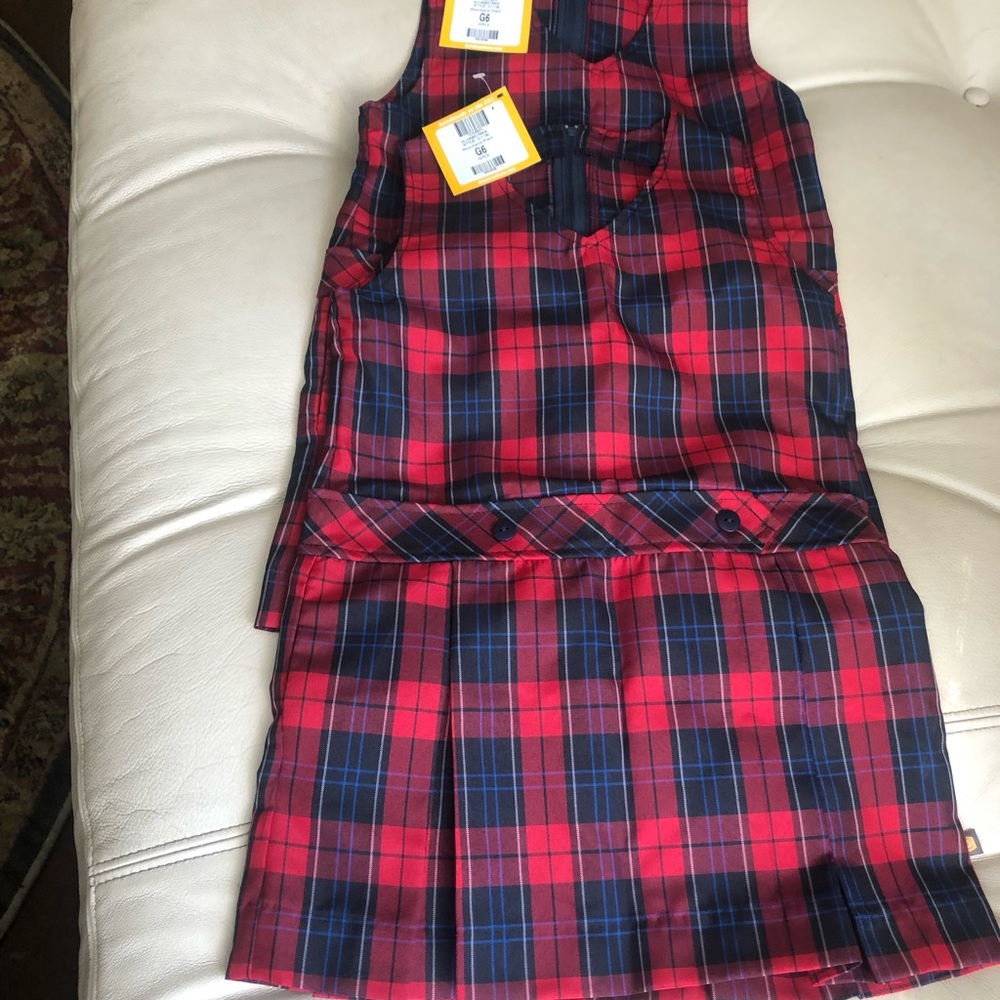 Two new with tags school uniforms girls size six. Never worn or used.